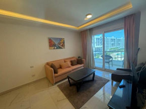 cozy one bedroom in a compound with beach ac
